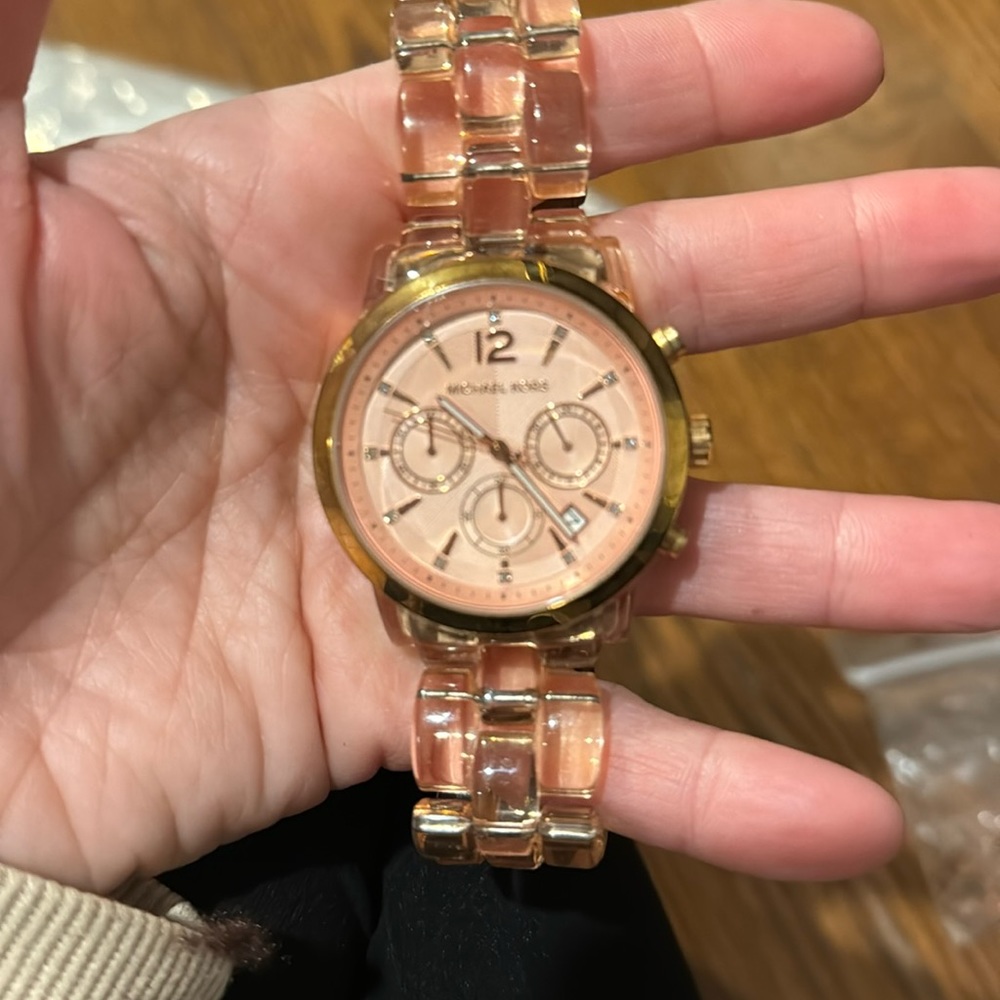 Michael Kors rose gold acrylic watch.